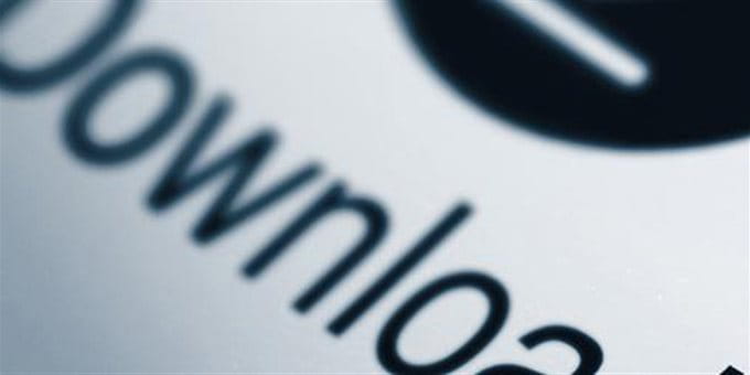 Eine Computertaste mit dem Wort Download. Eine Computertaste mit dem Wort Download.