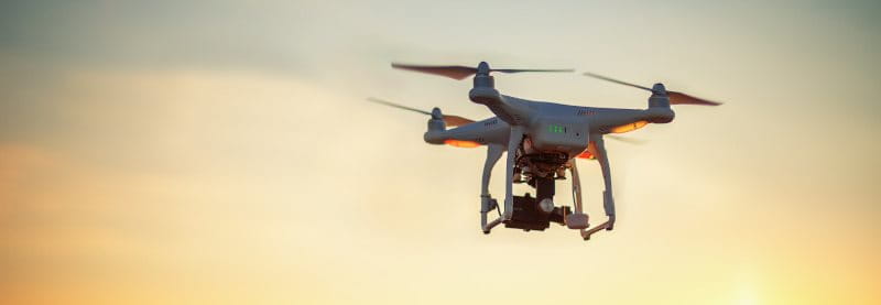 Young girl flies drone. Young girl flies drone.