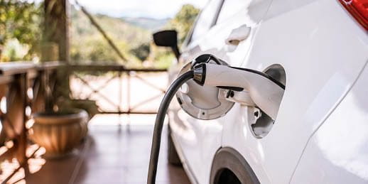 E-car parked at a charging station E-car parked at a charging station
