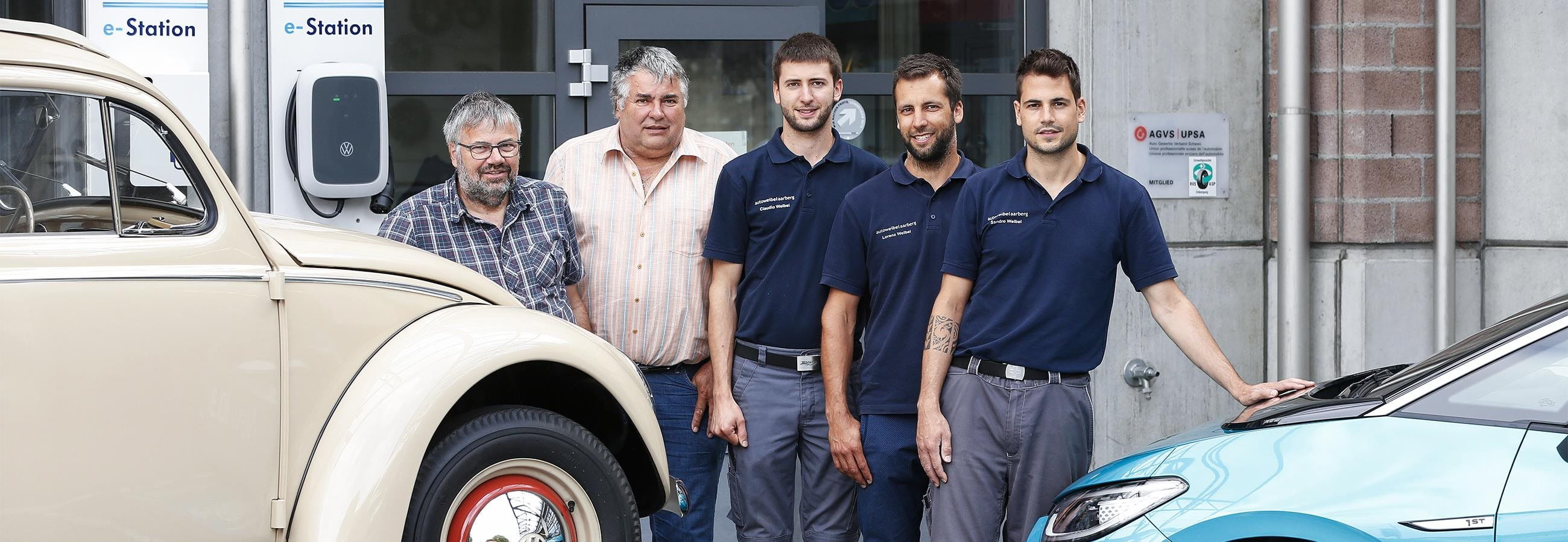 Owners of Weibel in front of their garage Owners of Weibel in front of their garage