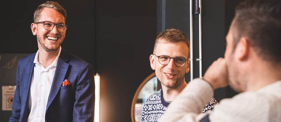 Men having a cheerful discussion Men having a cheerful discussion