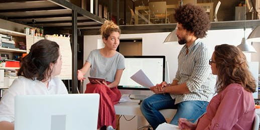 Team discussing something in the office Team discussing something in the office