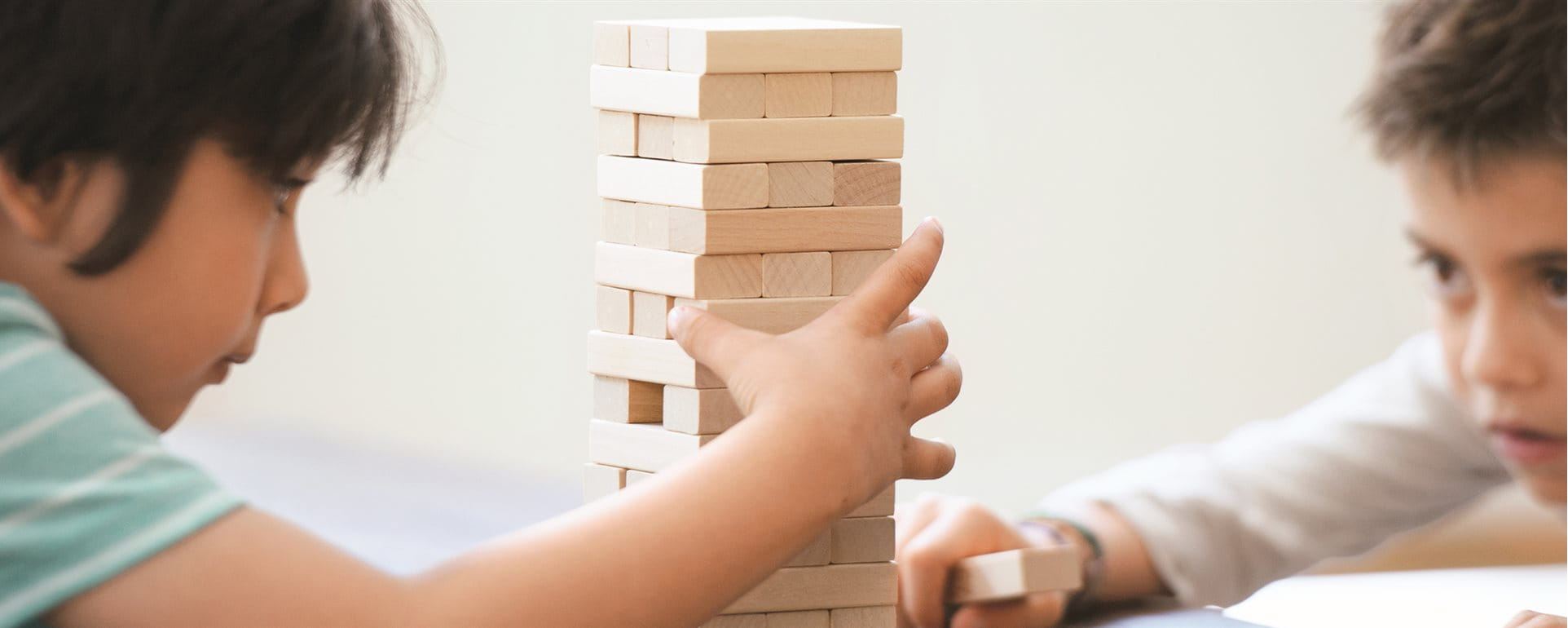 2 boys playing Jenga 2 boys playing Jenga