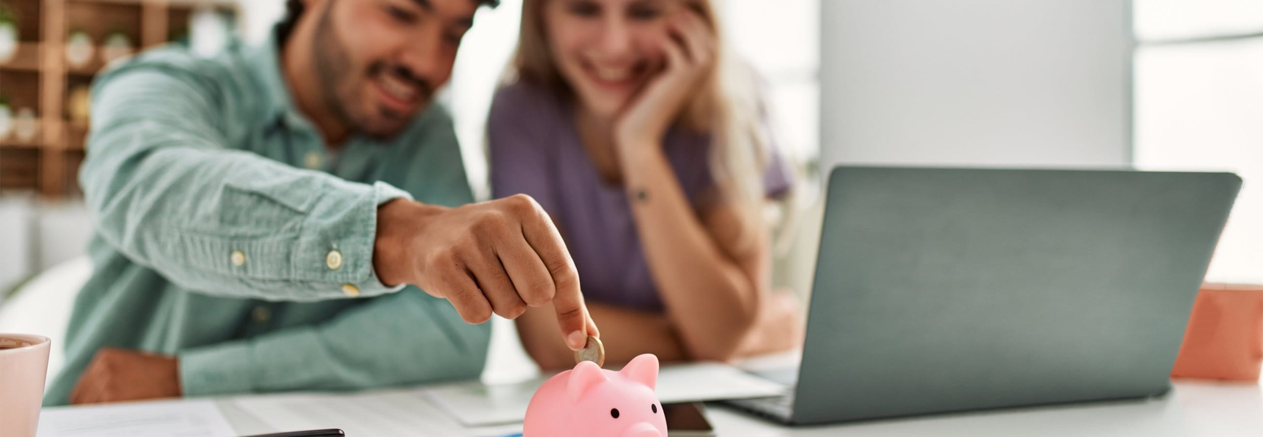 Woman, man and piggy bank Woman, man and piggy bank